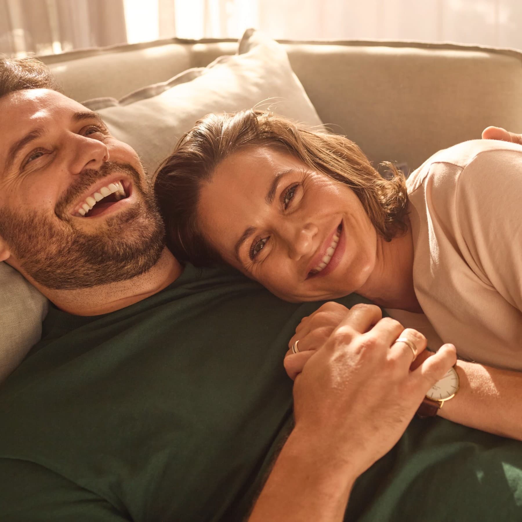 Couple relaxing on a couch