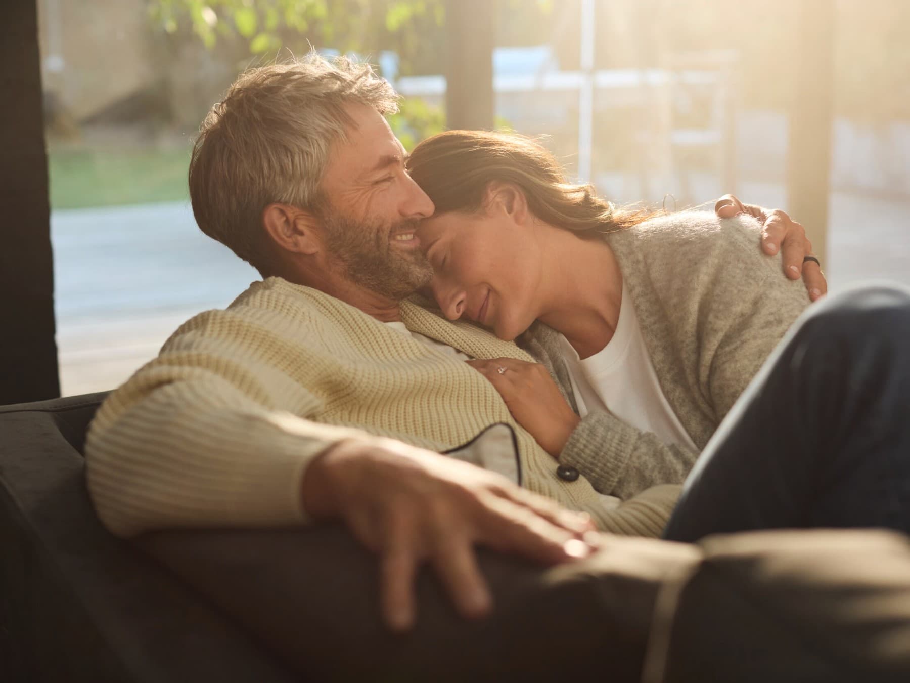 Couple lying on couch
