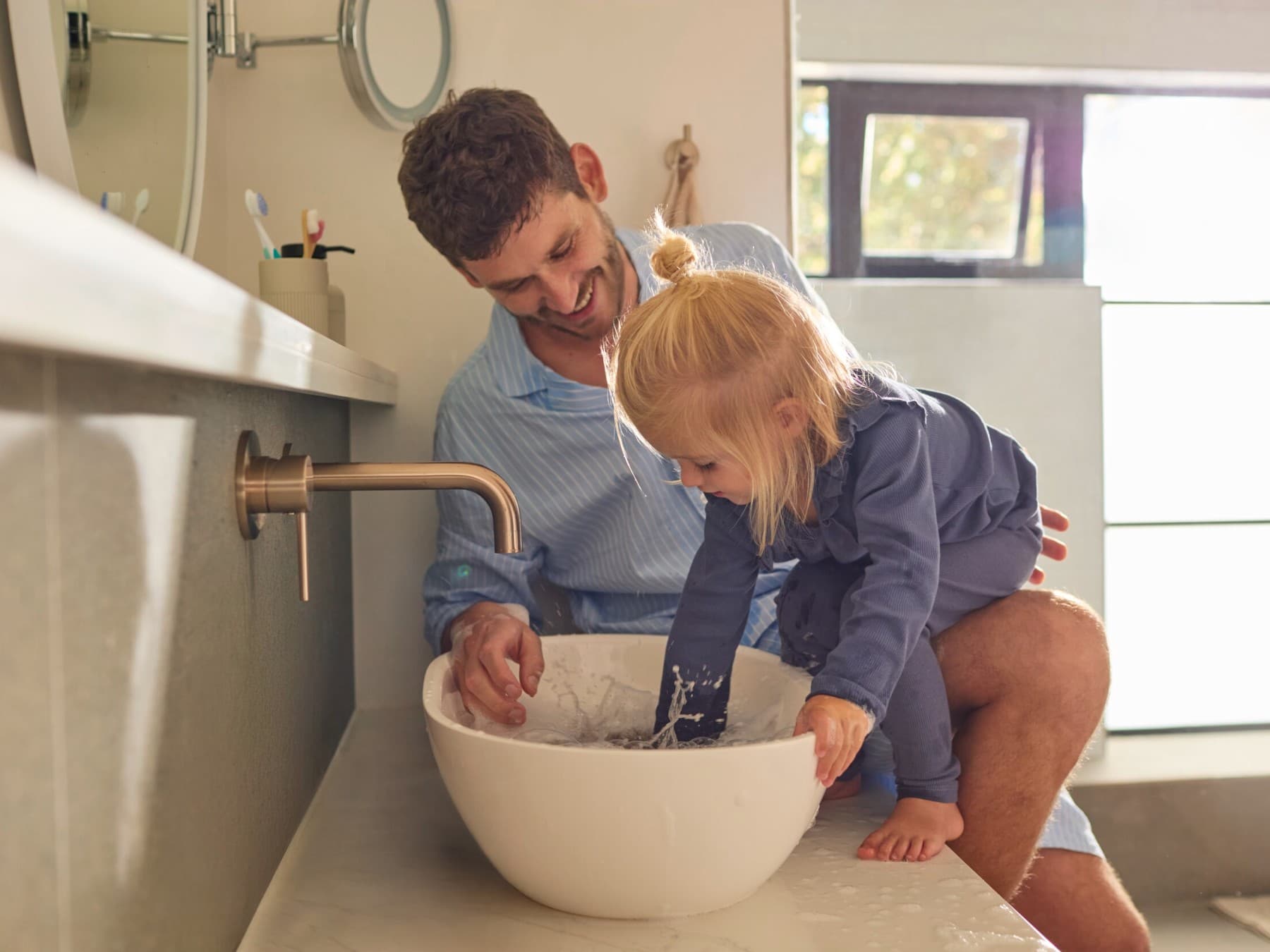 Father and daughter in the bathroom
