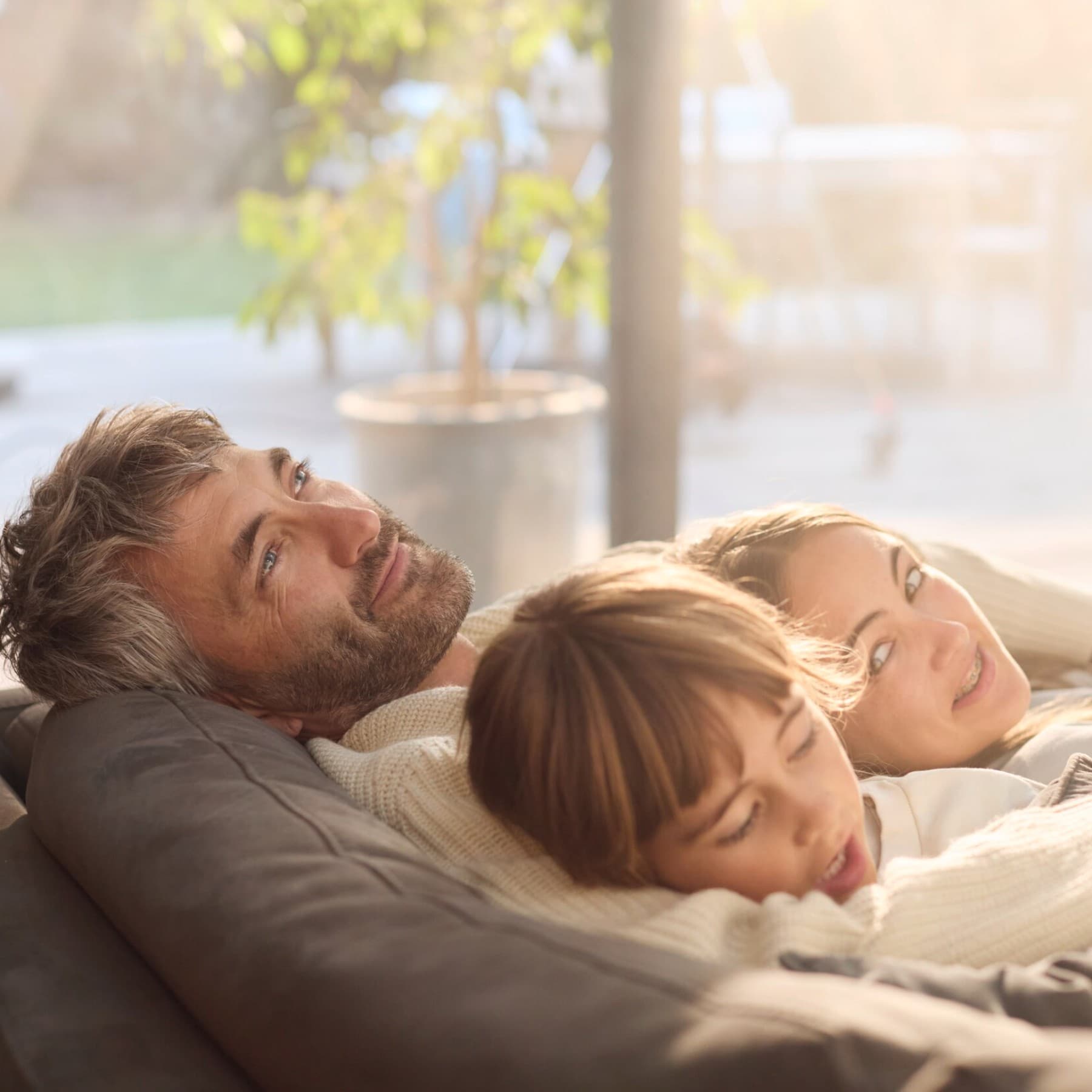 Family relaxing on a couch