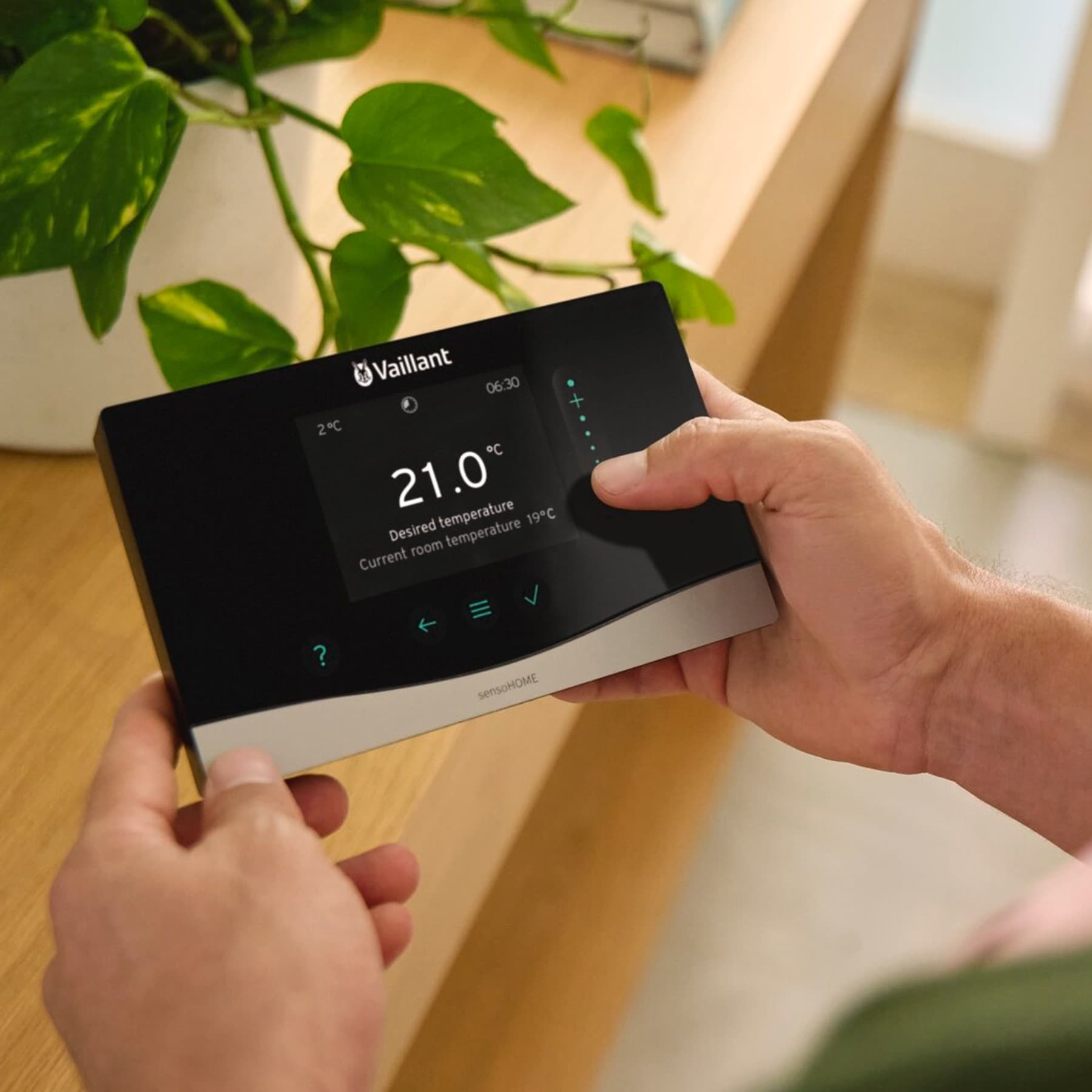 Man holding a control unit in his hands