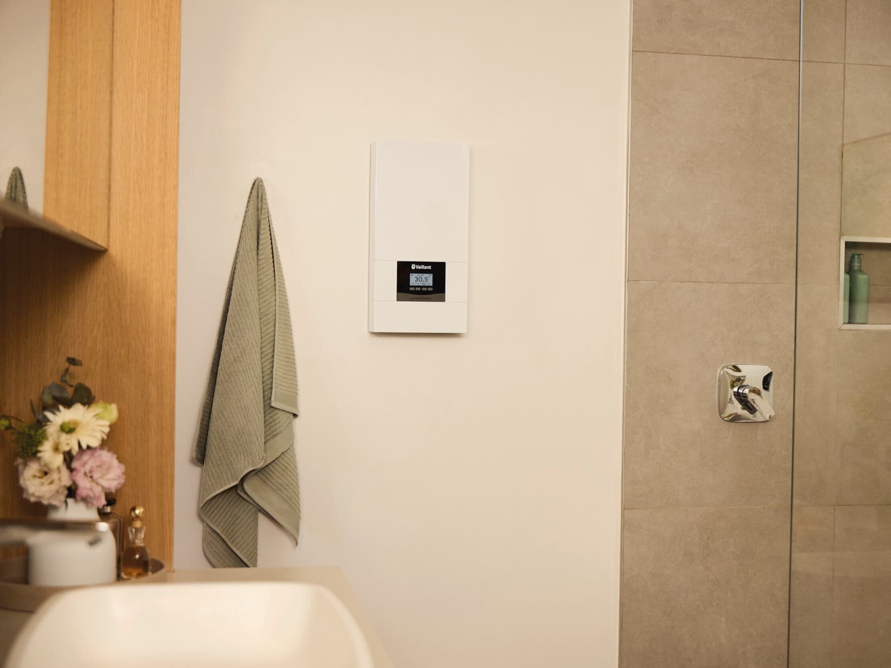 Vaillant instantaneous water heater electronicVED in bathroom