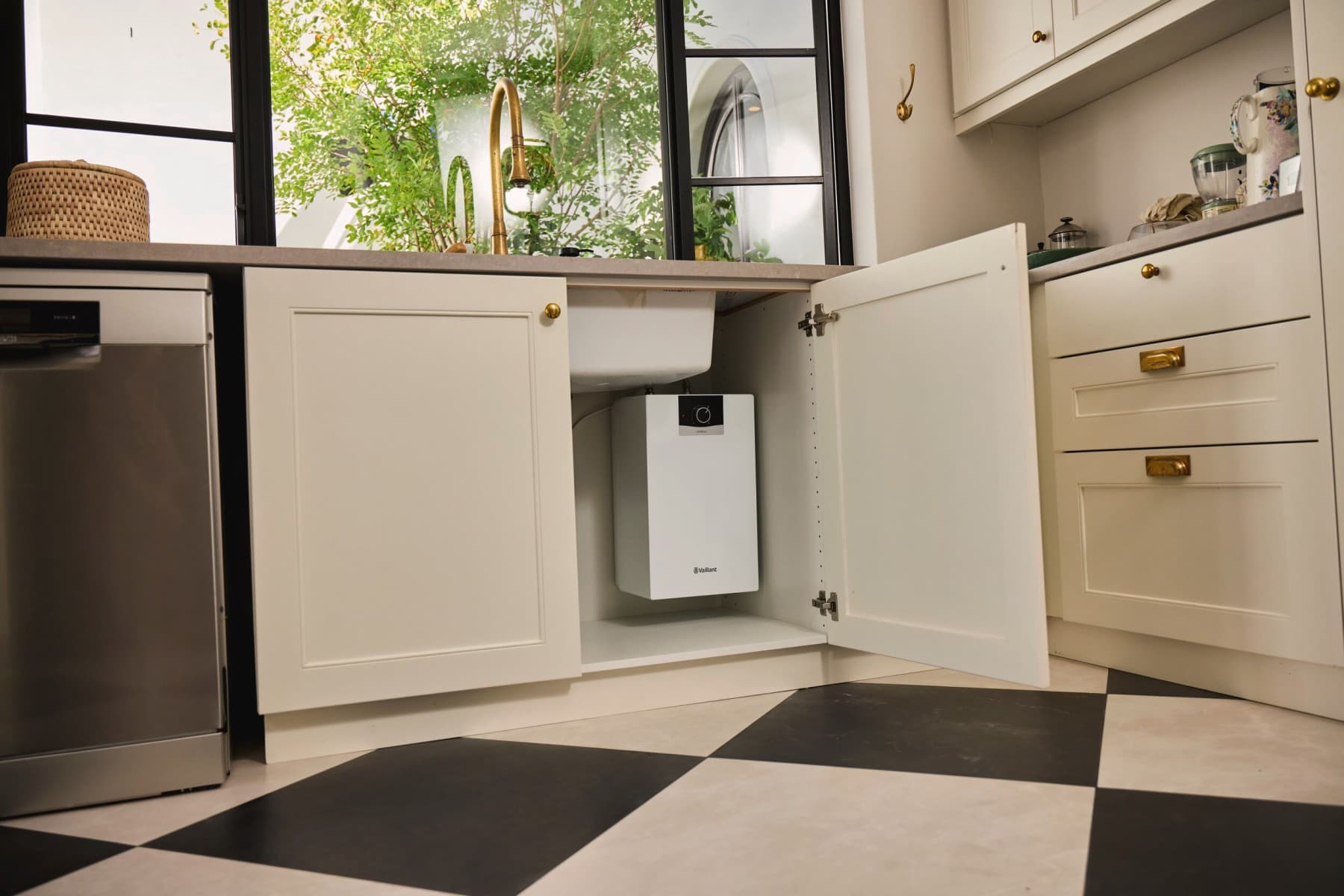 Electric water heater in the kitchen