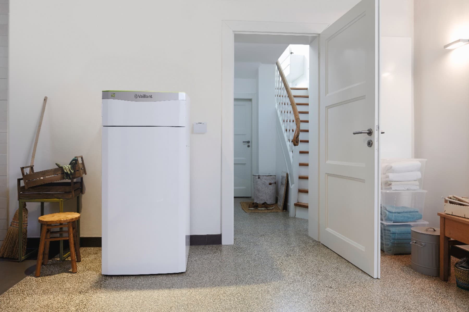 Water-source heat pump in a utility room