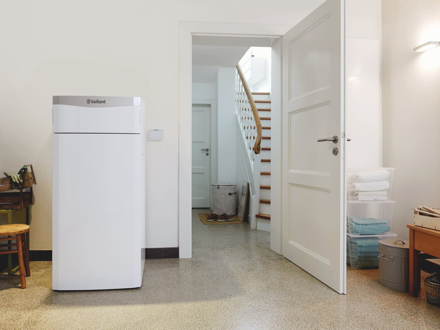 A water-source heat pump in a utility room