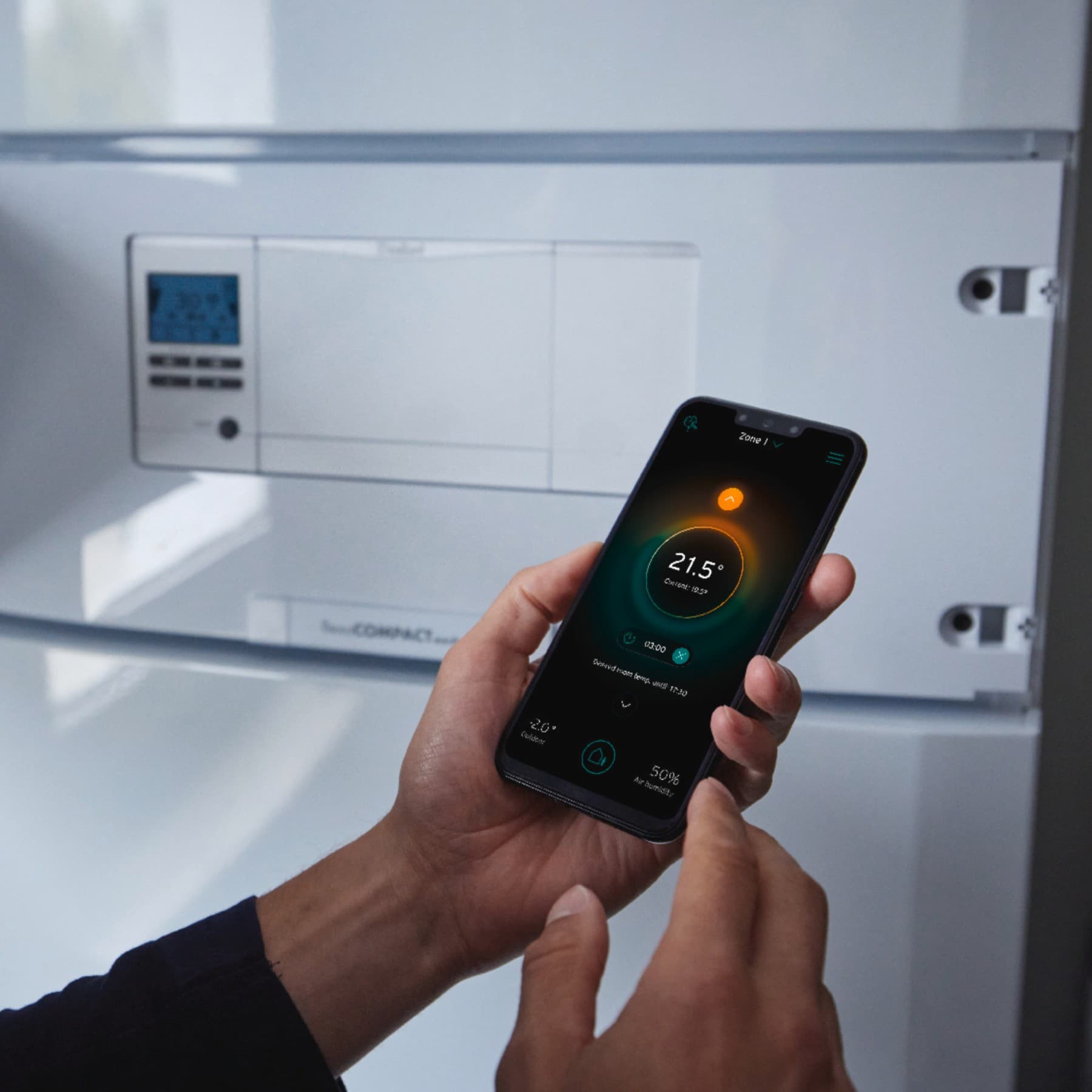 Man using a Vaillant control