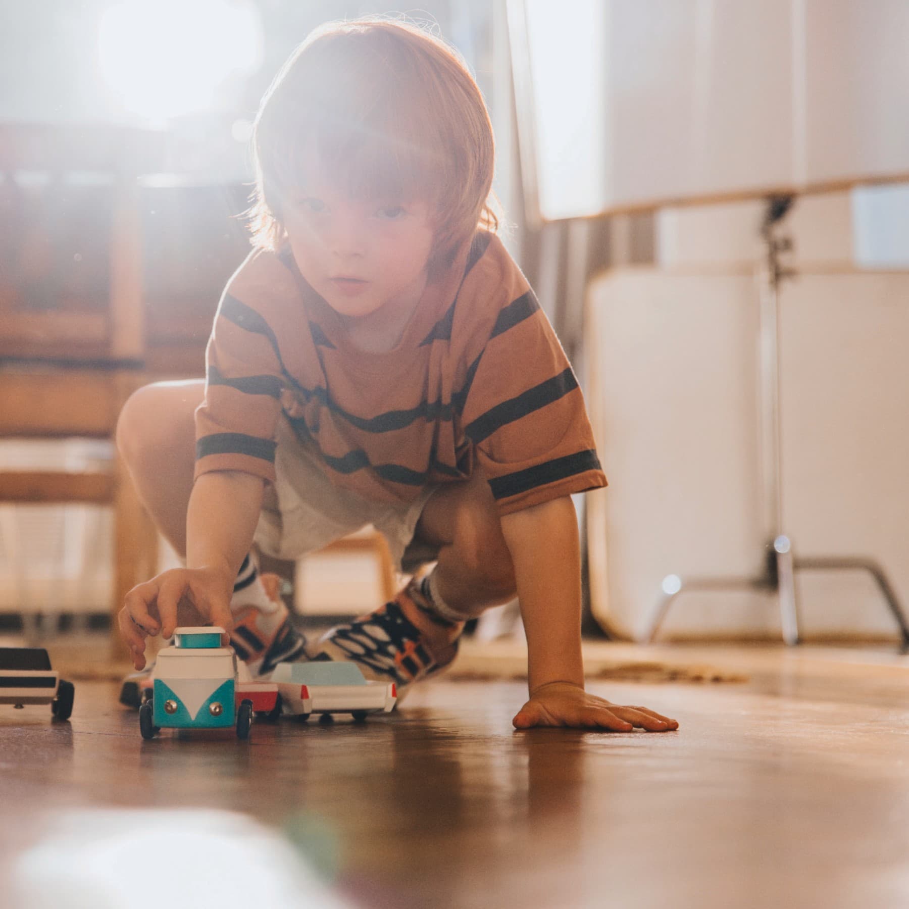 Child sitting on a heat pump counting money