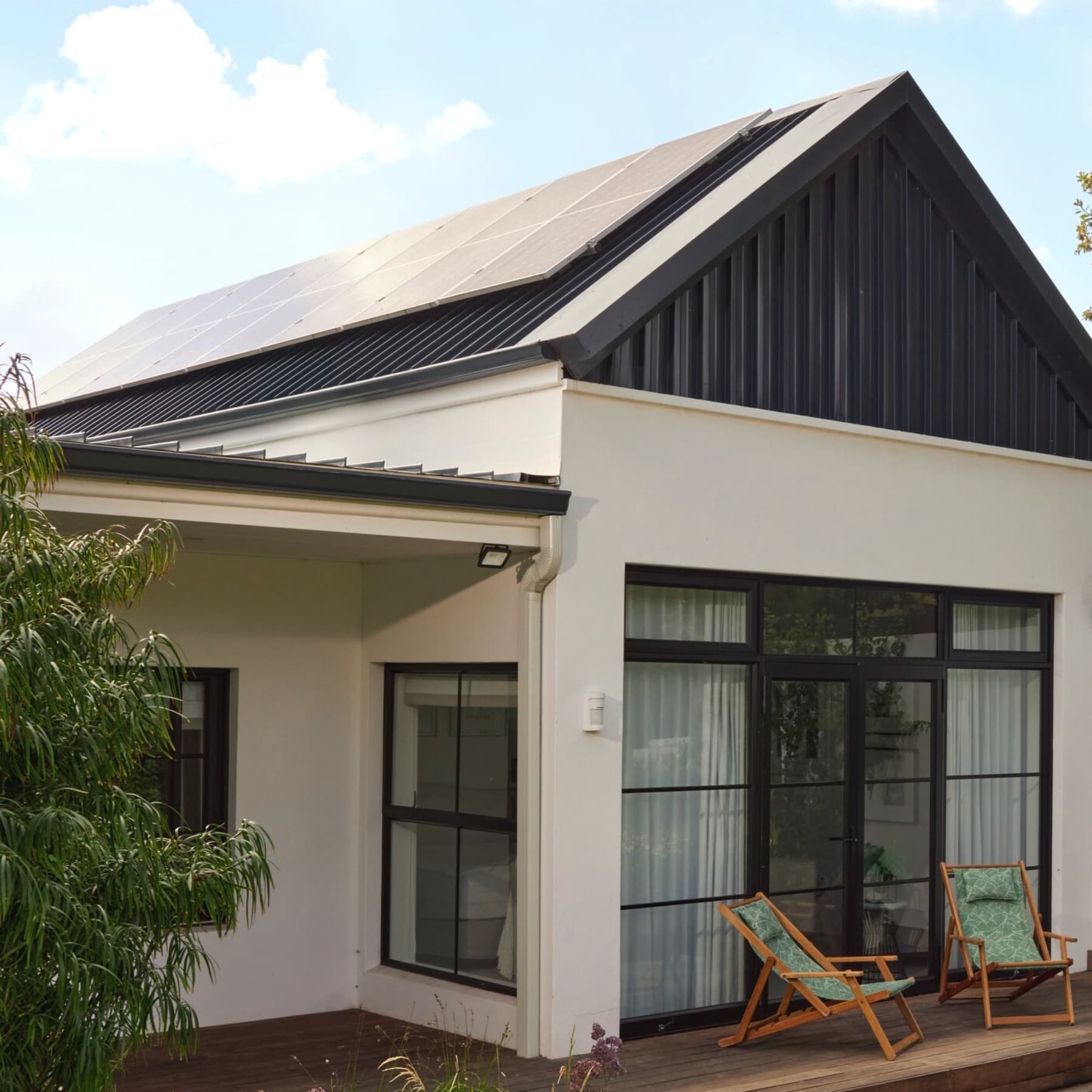 PV panels on the roof of a brick house