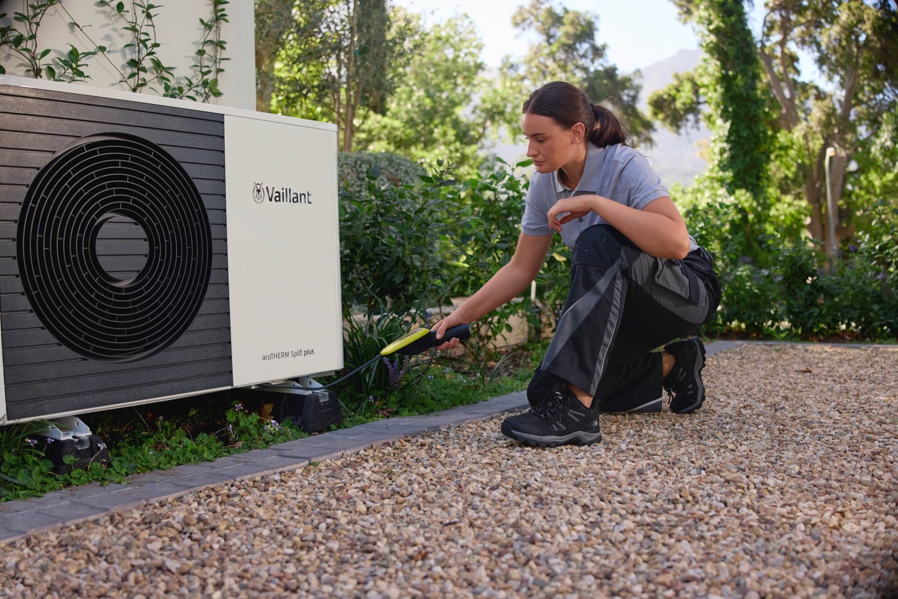 Installer working on a heat pump