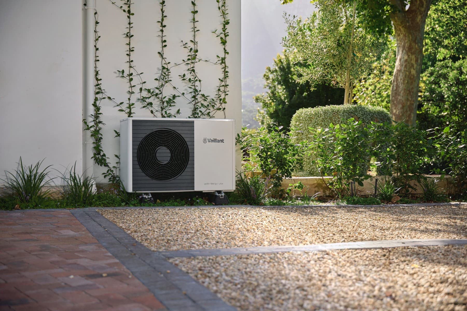 Heat pump standing in front of a wall
