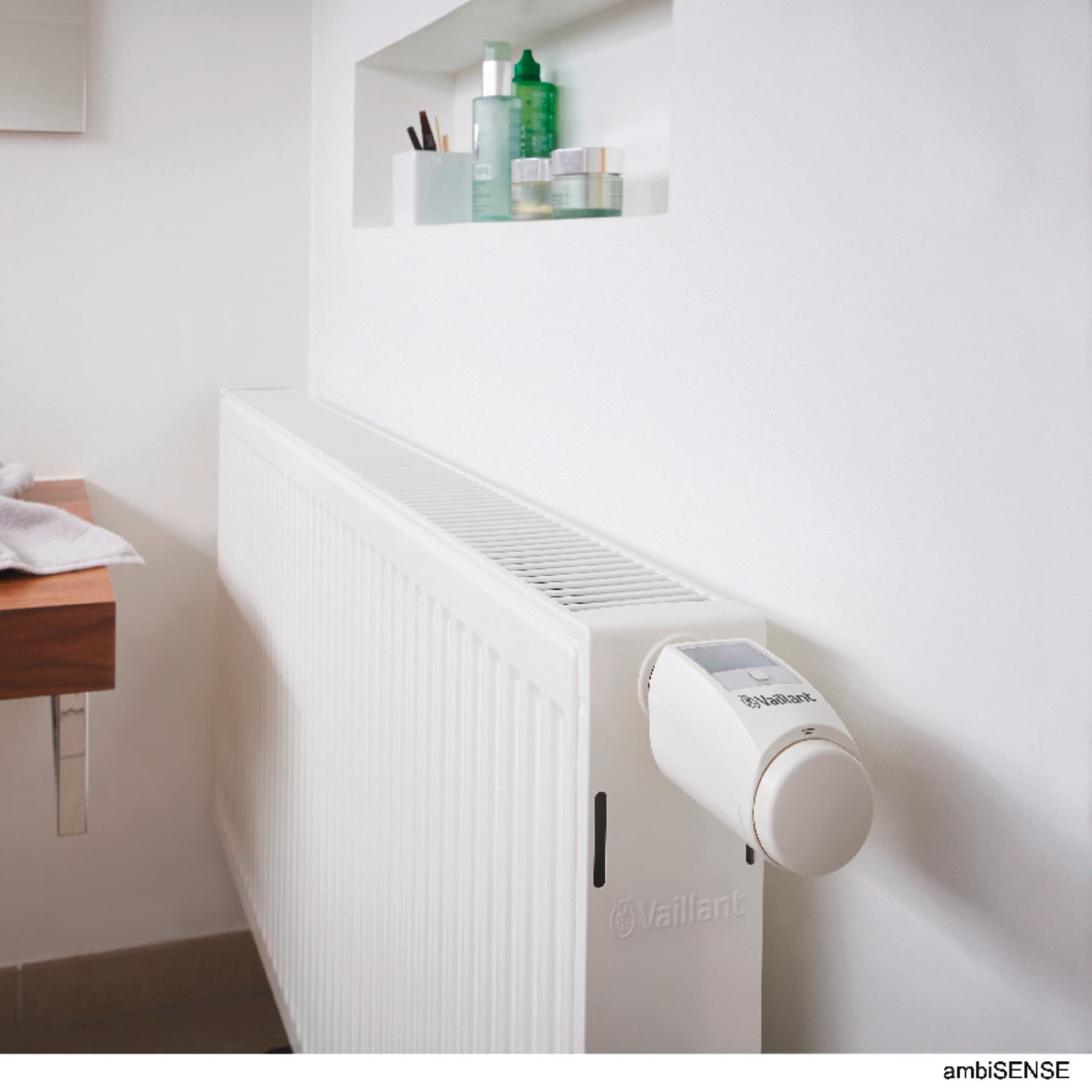 Radiator with Vaillant thermostat in bathroom