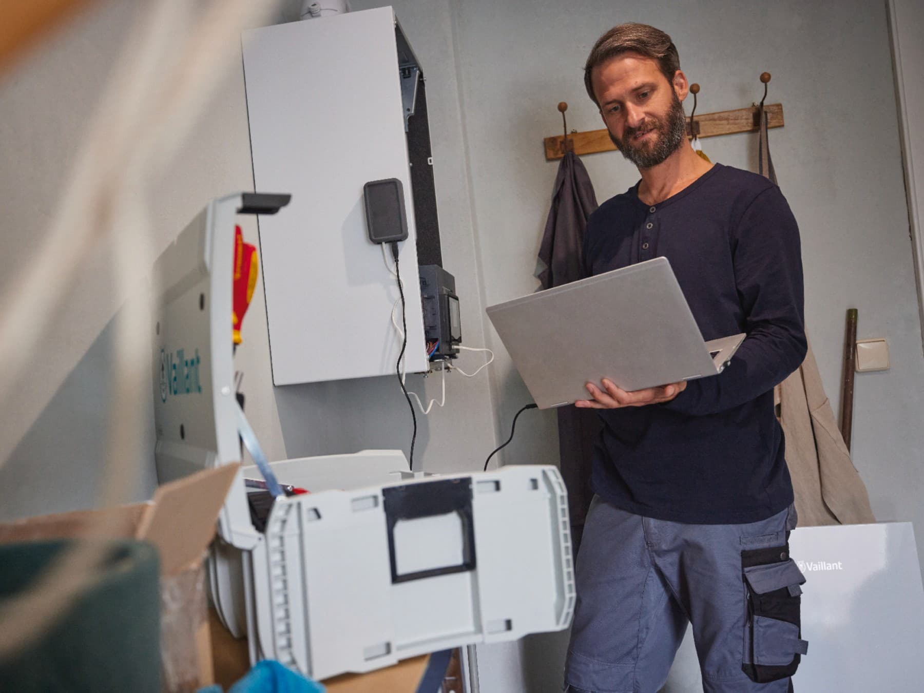 Installer is doing a boiler service
