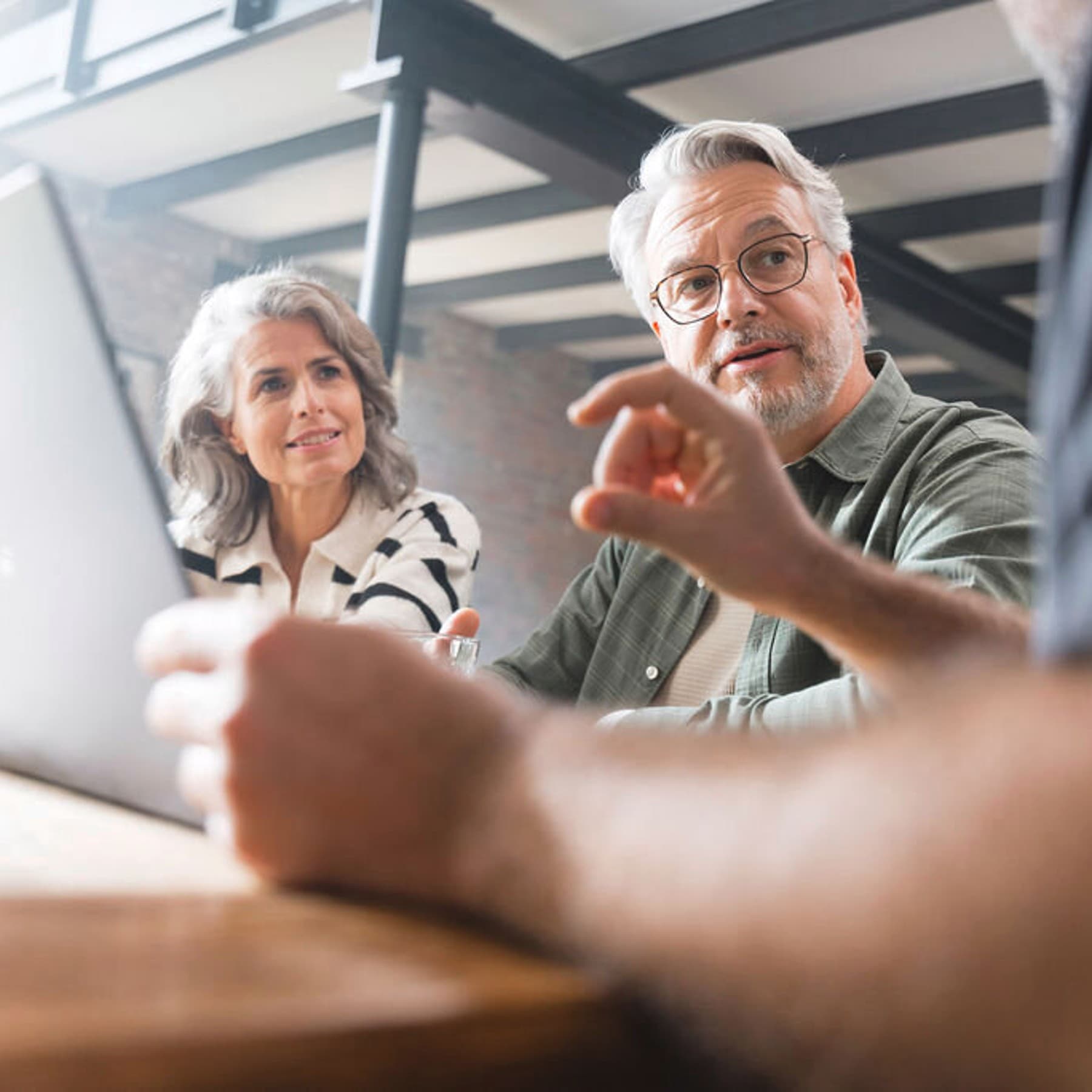 Couple in a consultation with an installer