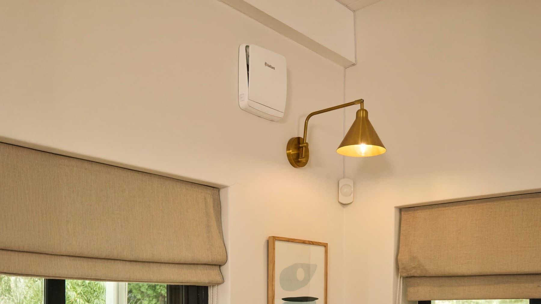 Middle-aged couple in front of heat pump