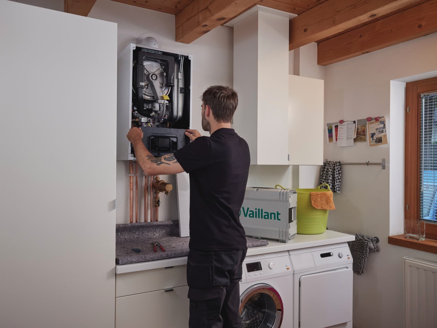 The engineer checks all the valves on the boiler